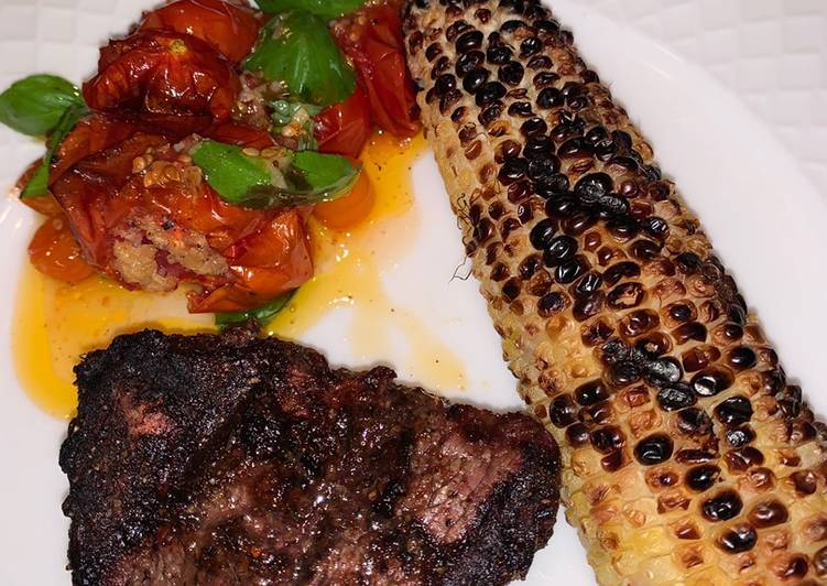 Grilled Fillet Mignon with grilled corn and roasted garlic tomatoes 🍅