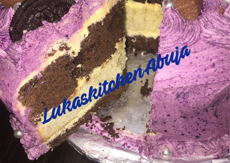 Easy Chocolate And Vanilla Birthday Cake with purple frosting
