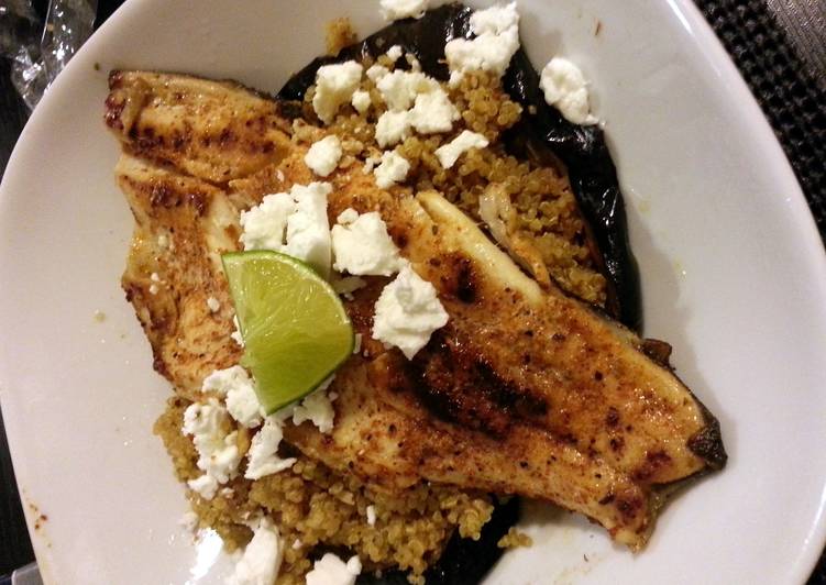 Pan seared trout served on quinoa chorizo  eggplant and French feta salad