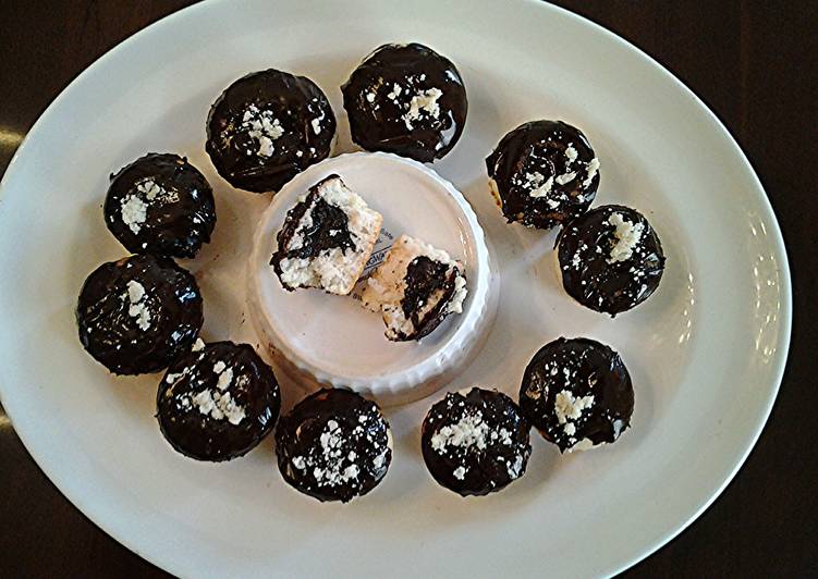 White Cupcakes with Chocolate Centers and Chocolate Glaze Icing
